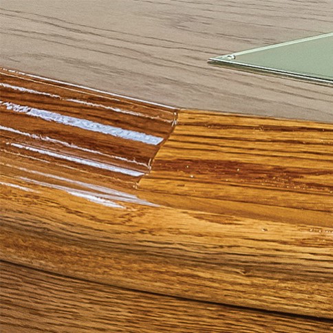 The double raised lid and solid oak mouldings of The Chatsworth, showing the stepped profile and high gloss finish